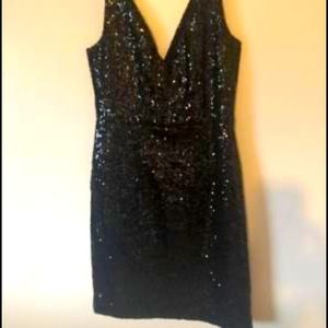 Gorgeous mini black sequin dress.